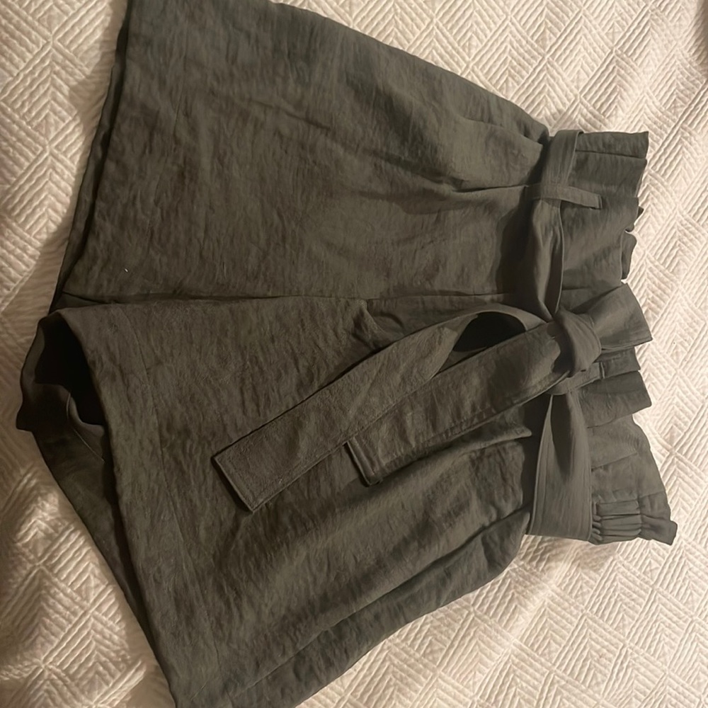 Never worn paper bag shorts.